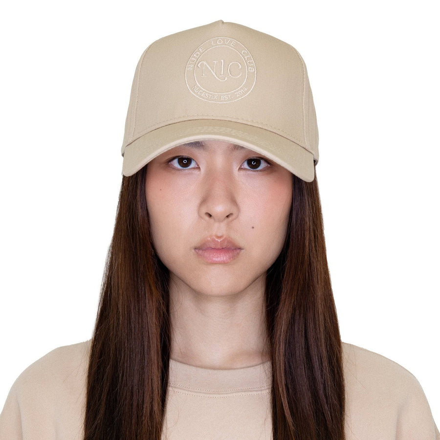 NUDE LOVE CLUB EMBLEM TRUCKER HAT front view