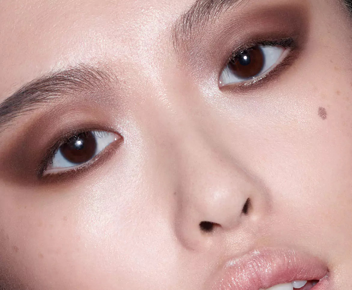 Asian young woman with brown smokey eye makeup