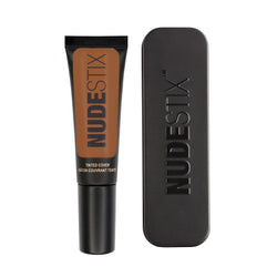 Tinted Cover Liquid Foundation in shade nude 10 and Nudestix can