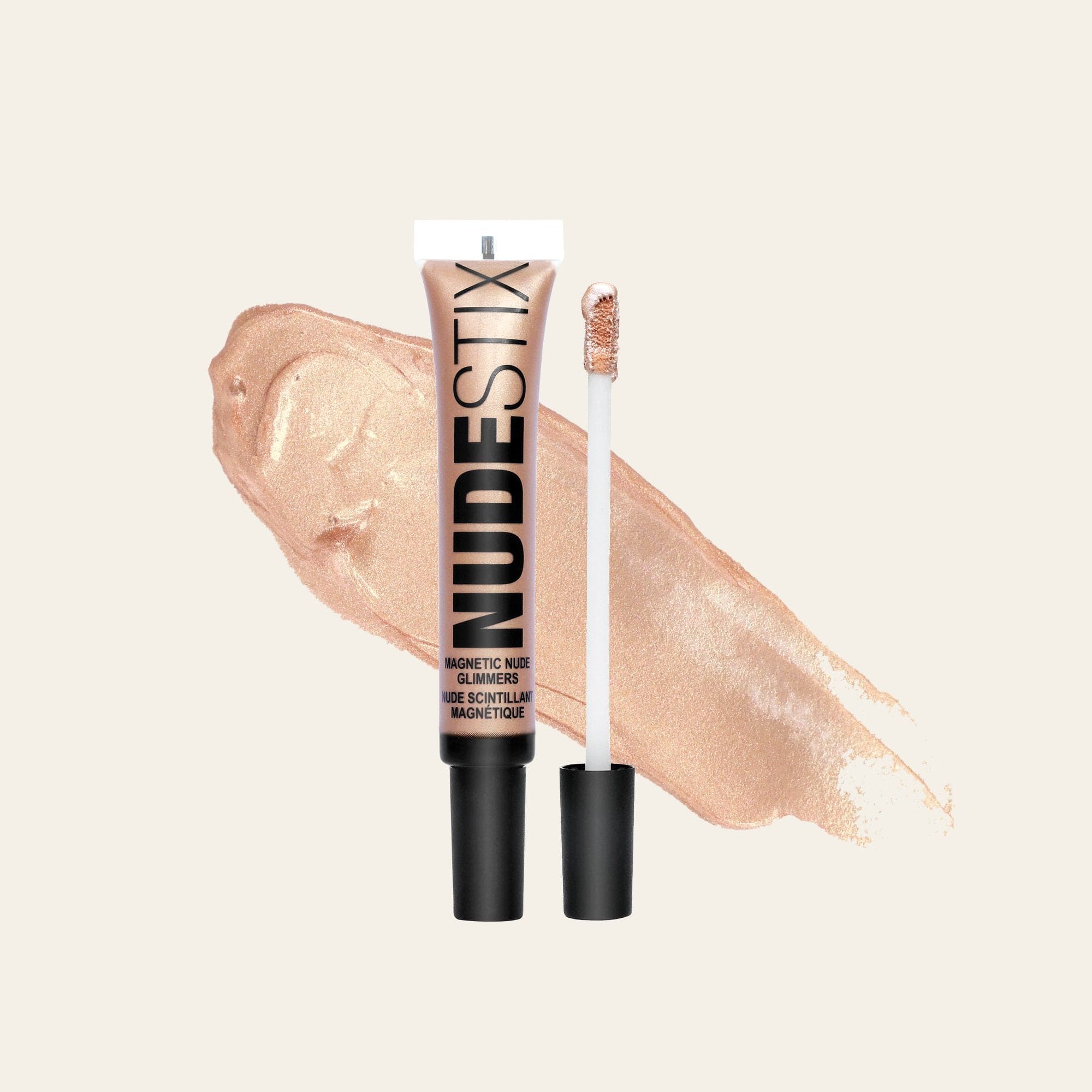 Magnetic Nude Glimmers Liquid Highlighter in shade 24k goddess with texture swatch