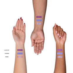 Arms with swatches of dreamy easy eyes mini kit