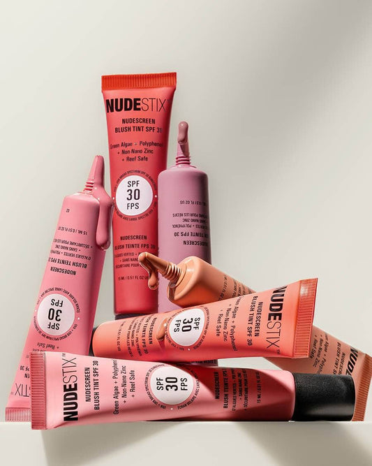Tubes of Nudescreen Blush Tint piled up