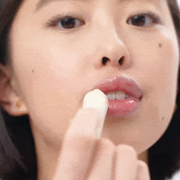 Asian young woman applying on Hydra-Peptide Lip Butter Clear Gloss