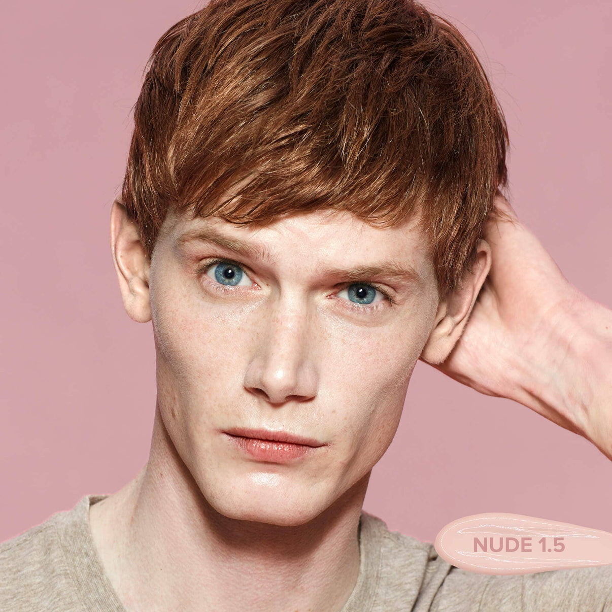 Red haired young man wearing Tinted Cover Foundation Nude 1.5