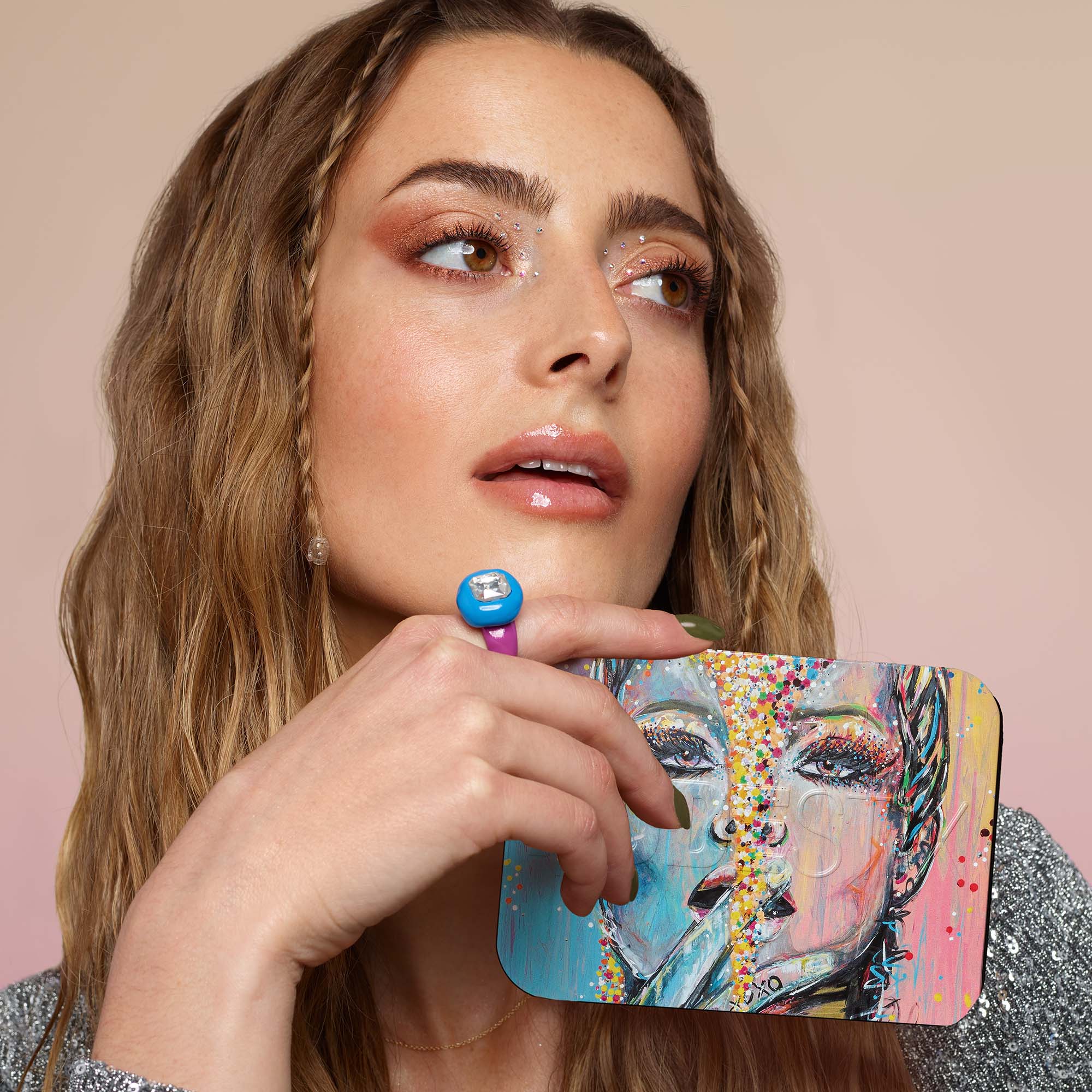 Taylor Frankel holding a can of Euphoric Nudes Festival Palette