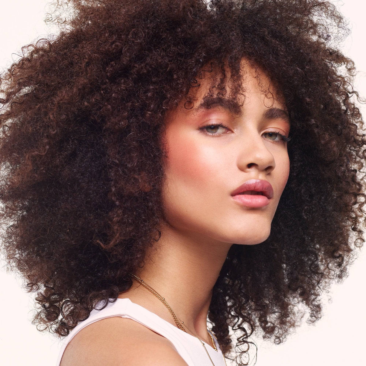 Young woman wearing Nudies Matte Lux in shade Juicy Melons -7