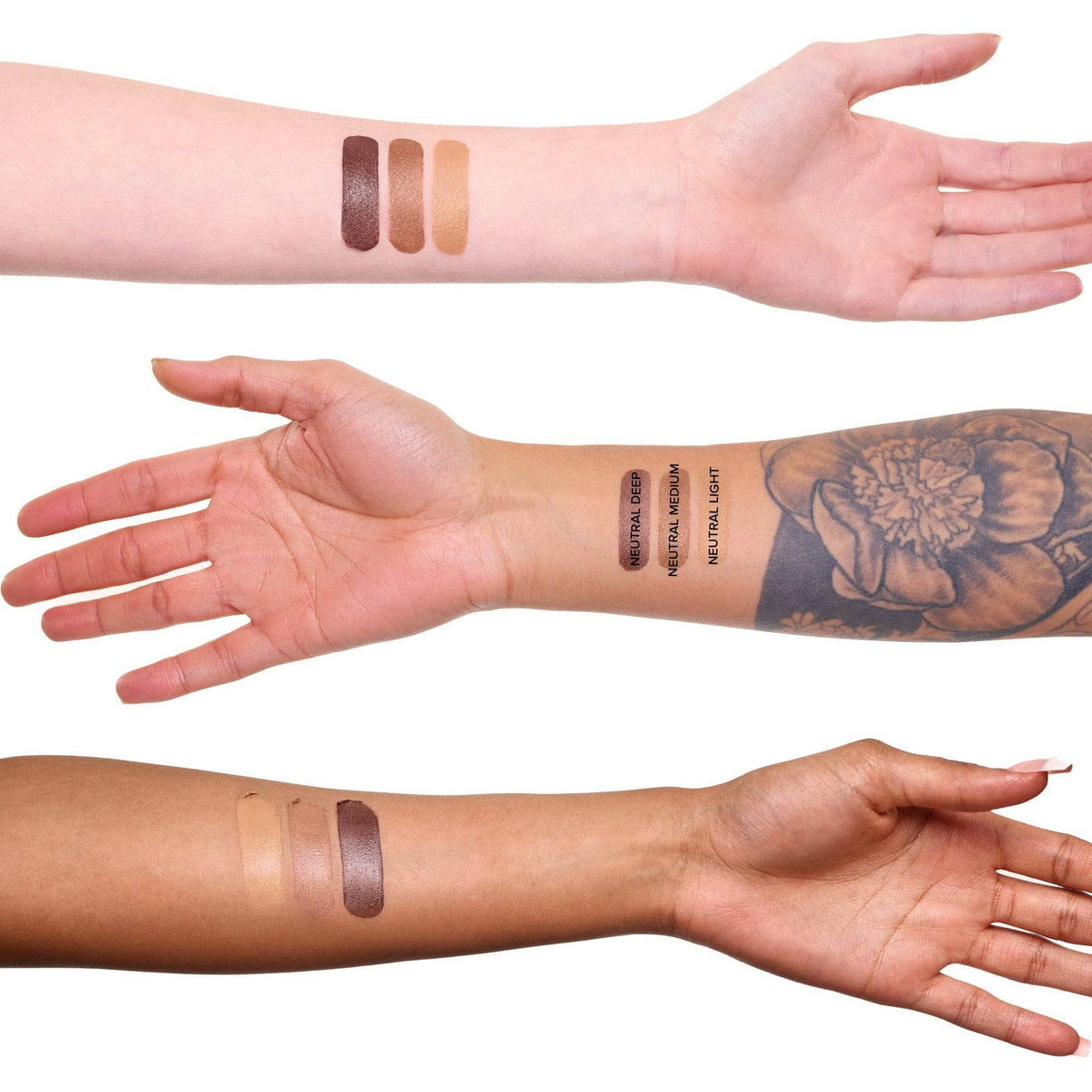 Arms with swatches of Tinted Blur Sculpt Stick light