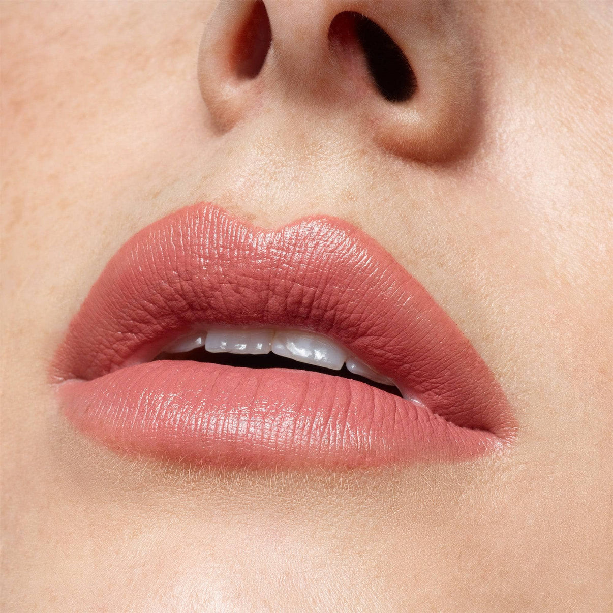Lips wearing intense matte lip pencil in shade Mystic