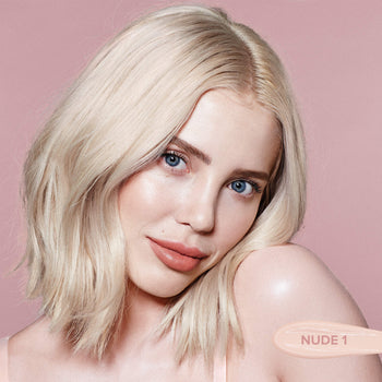 Fair skinned young woman wearing Tinted cover foundation in shade Nude 1