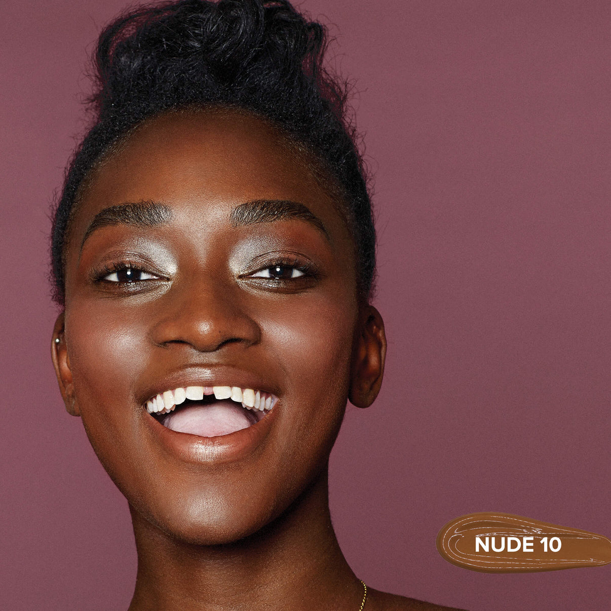 Young woman wearing Tinted Cover Liquid Foundation in shade nude 10