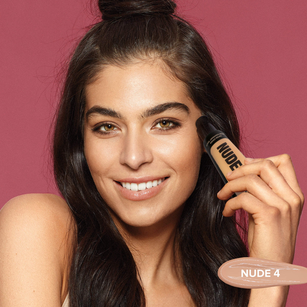 Young woman wearing Tinted Cover Liquid Foundation in shade nude 4