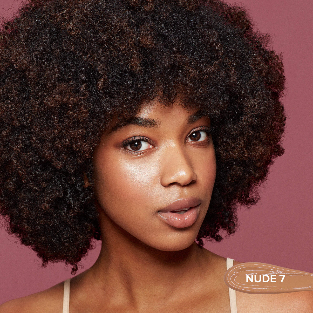 Young woman wearing Tinted Cover Liquid Foundation in shade nude 7