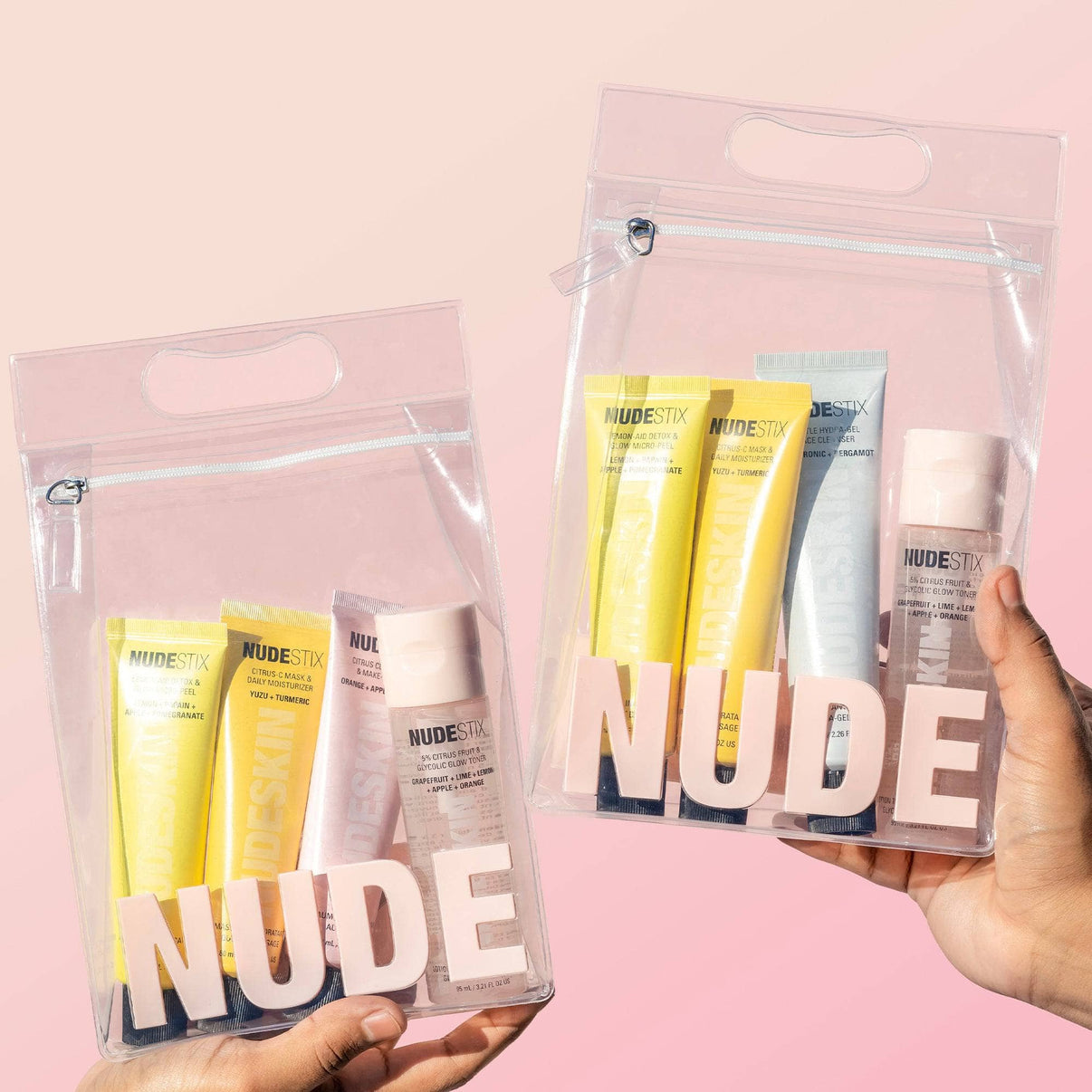 two hands holding Nude Essentials kit inside their bags - 3