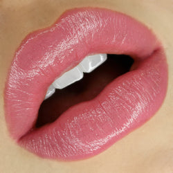 Lips wearing Gel Color Lip and Cheek Balm in shade rebel