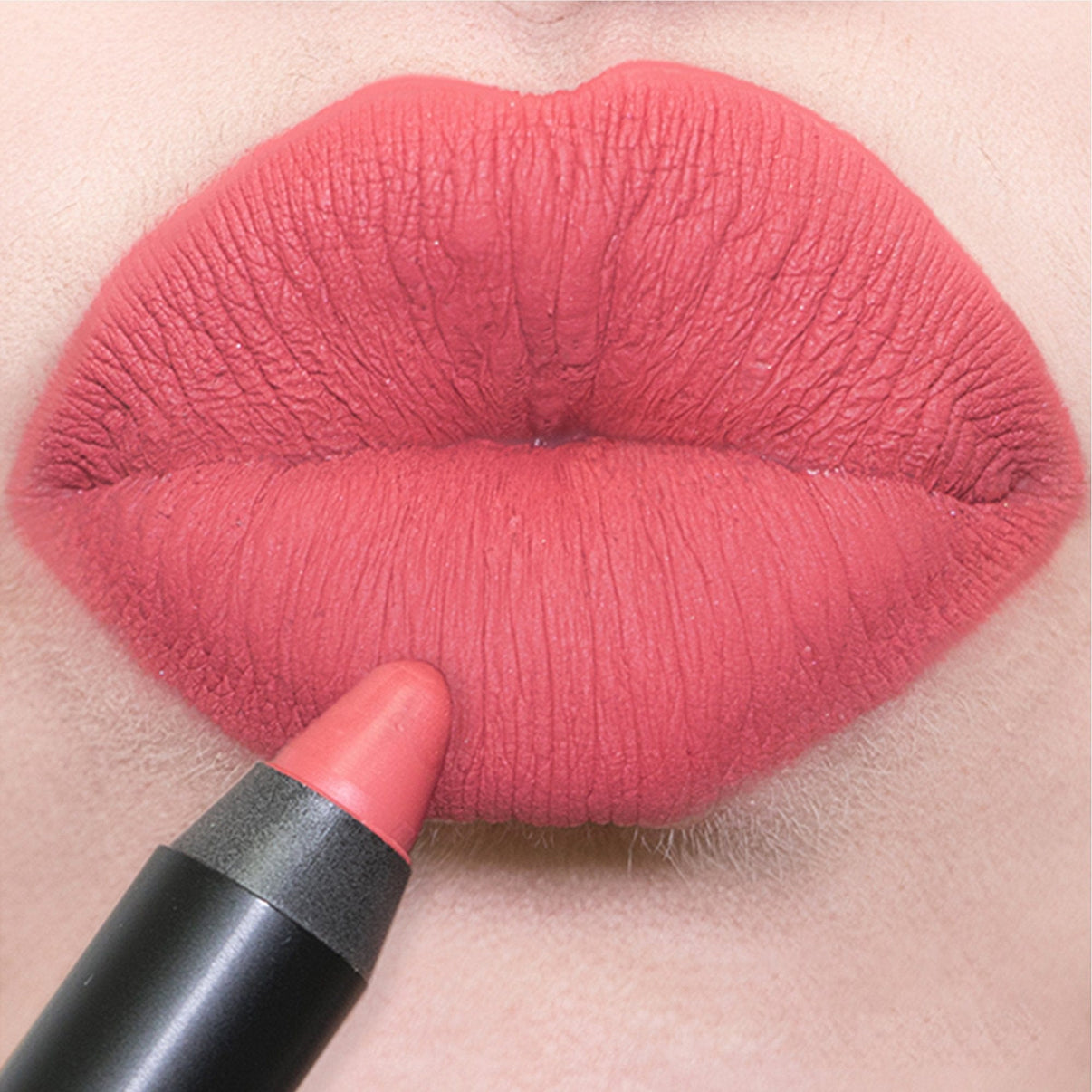 lip makeup with  Magnetic Matte Lip Color in shade capri