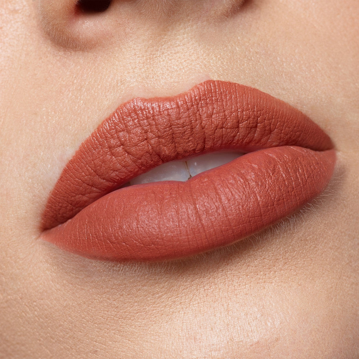 Lips with Intense Matte Lip + Cheek pencil in shade fringe