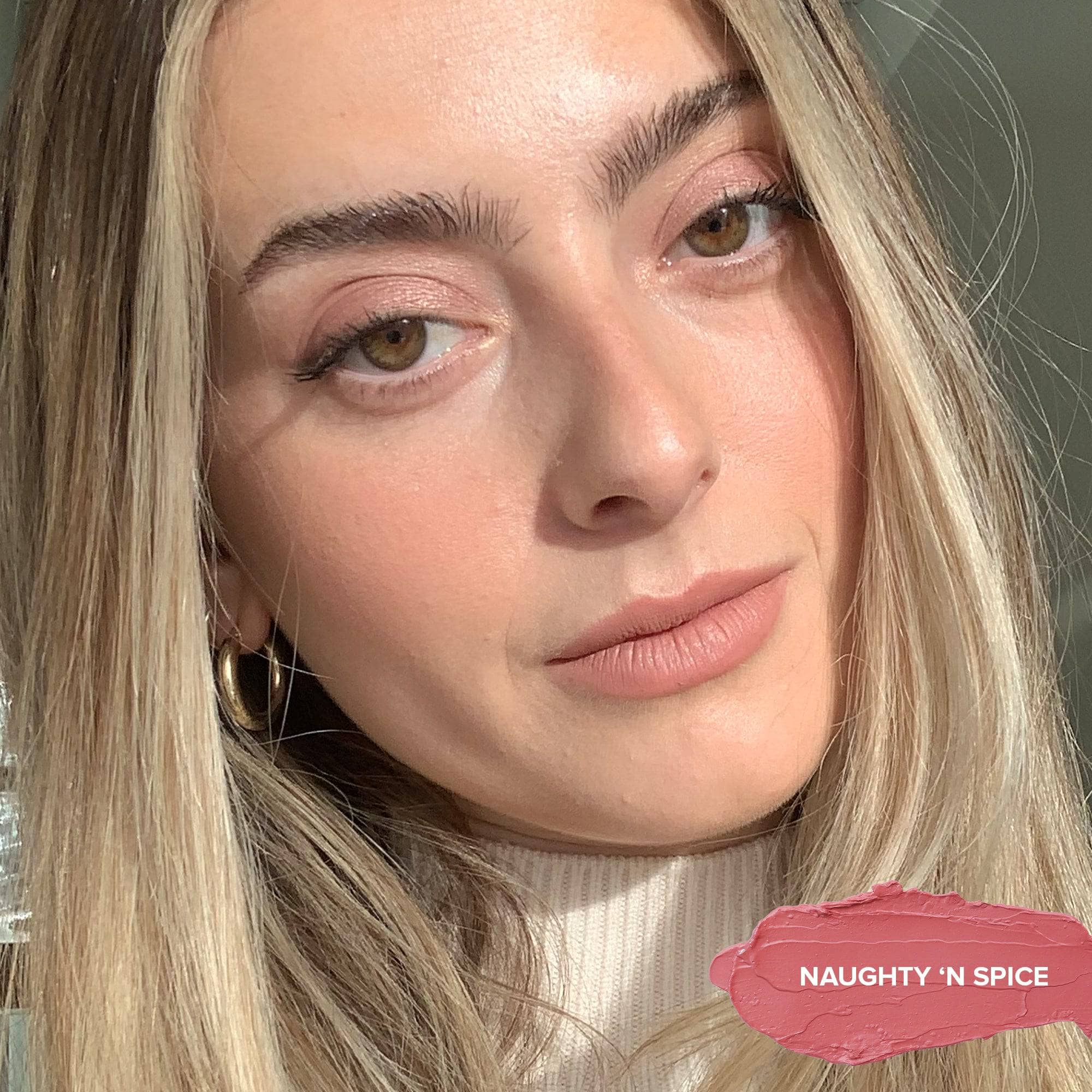 Taylor Frankel wearing Nudies Blush Stick in shade Naughty N' Spice
