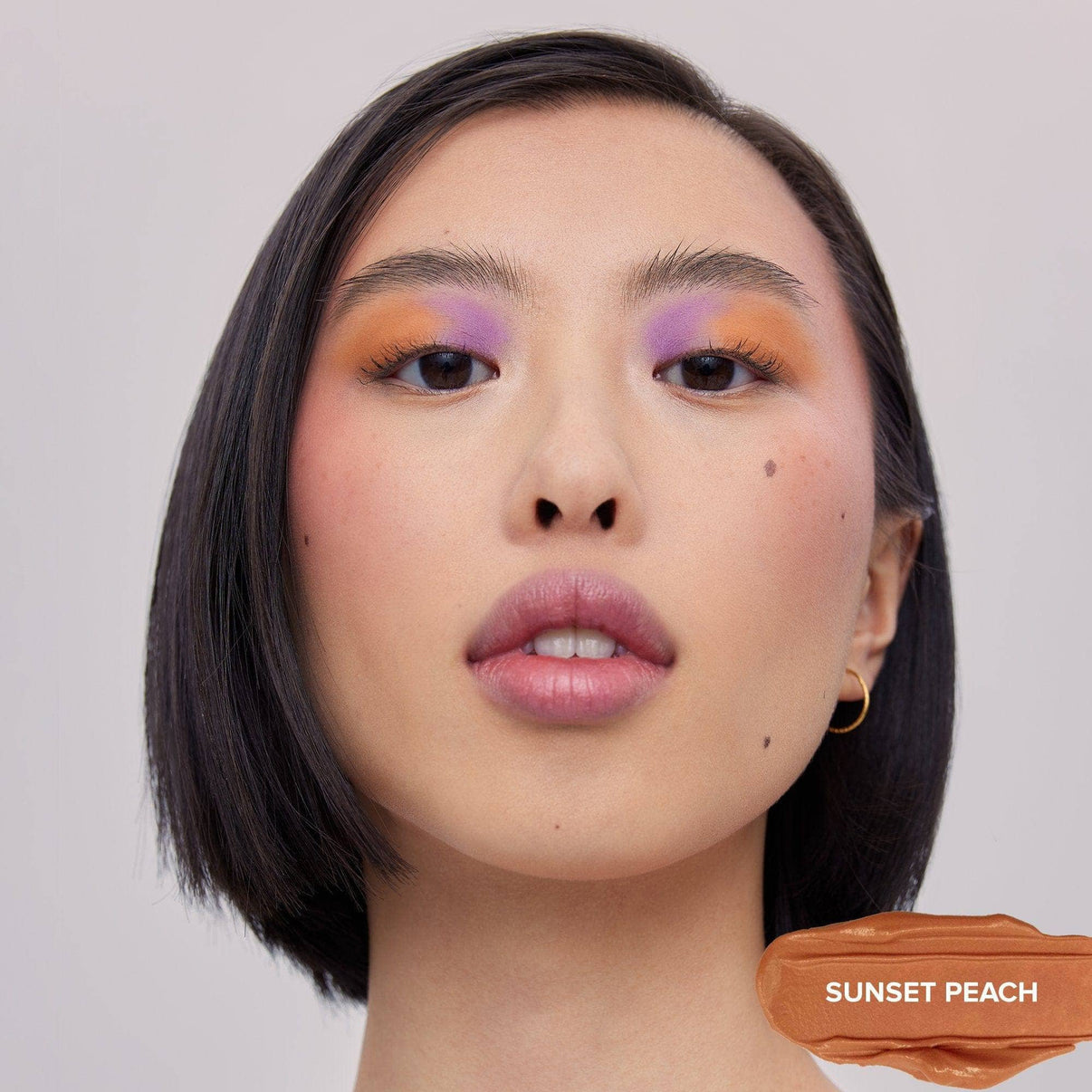 Face makeup with Magnetic Plush Paints in shade sunset peach