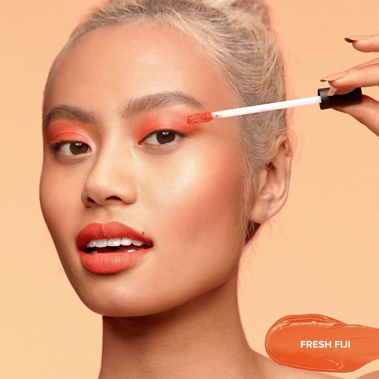 Model applying on Magnetic Plush Paints in shade fresh fiji