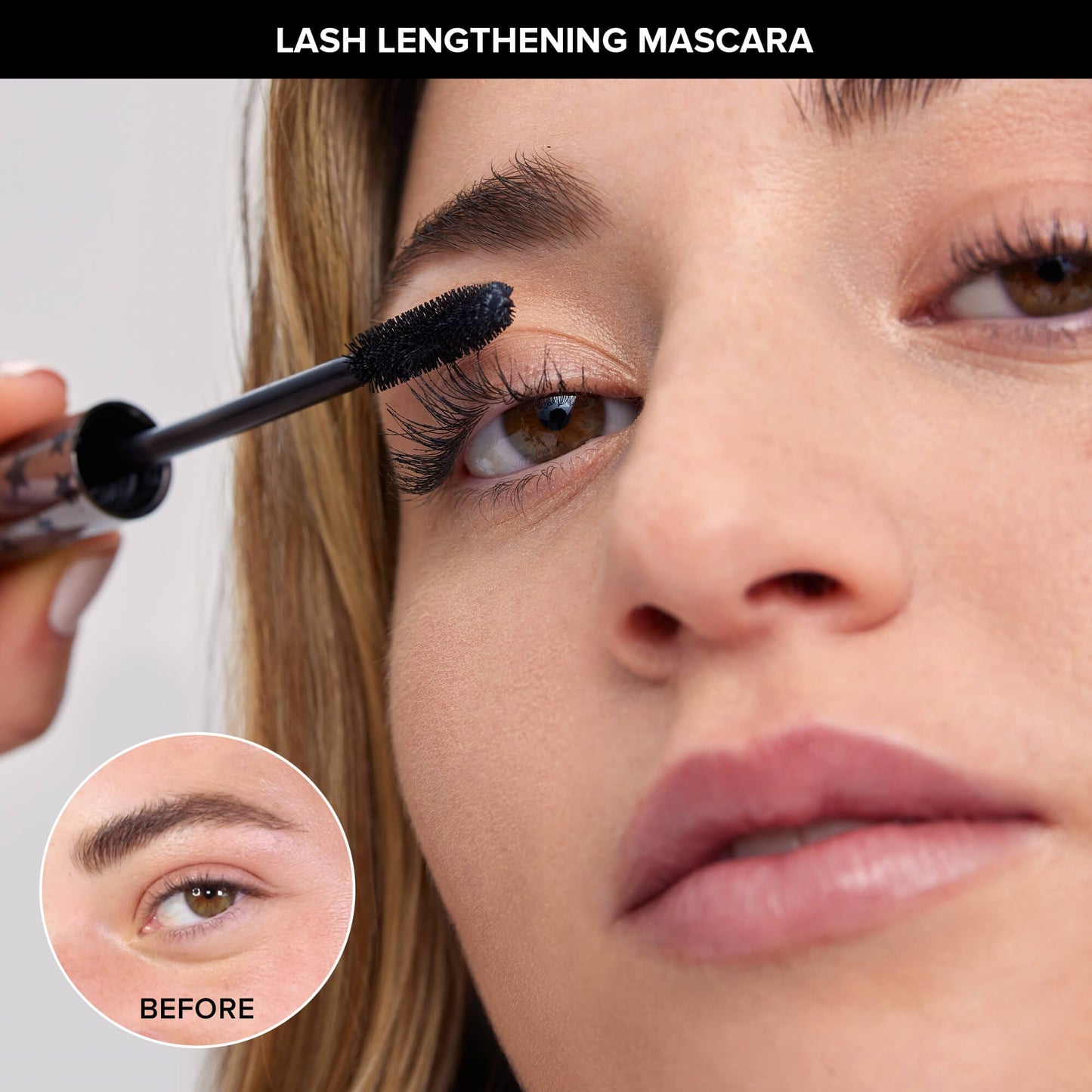 Young woman applying Lash Lengthening Mascara