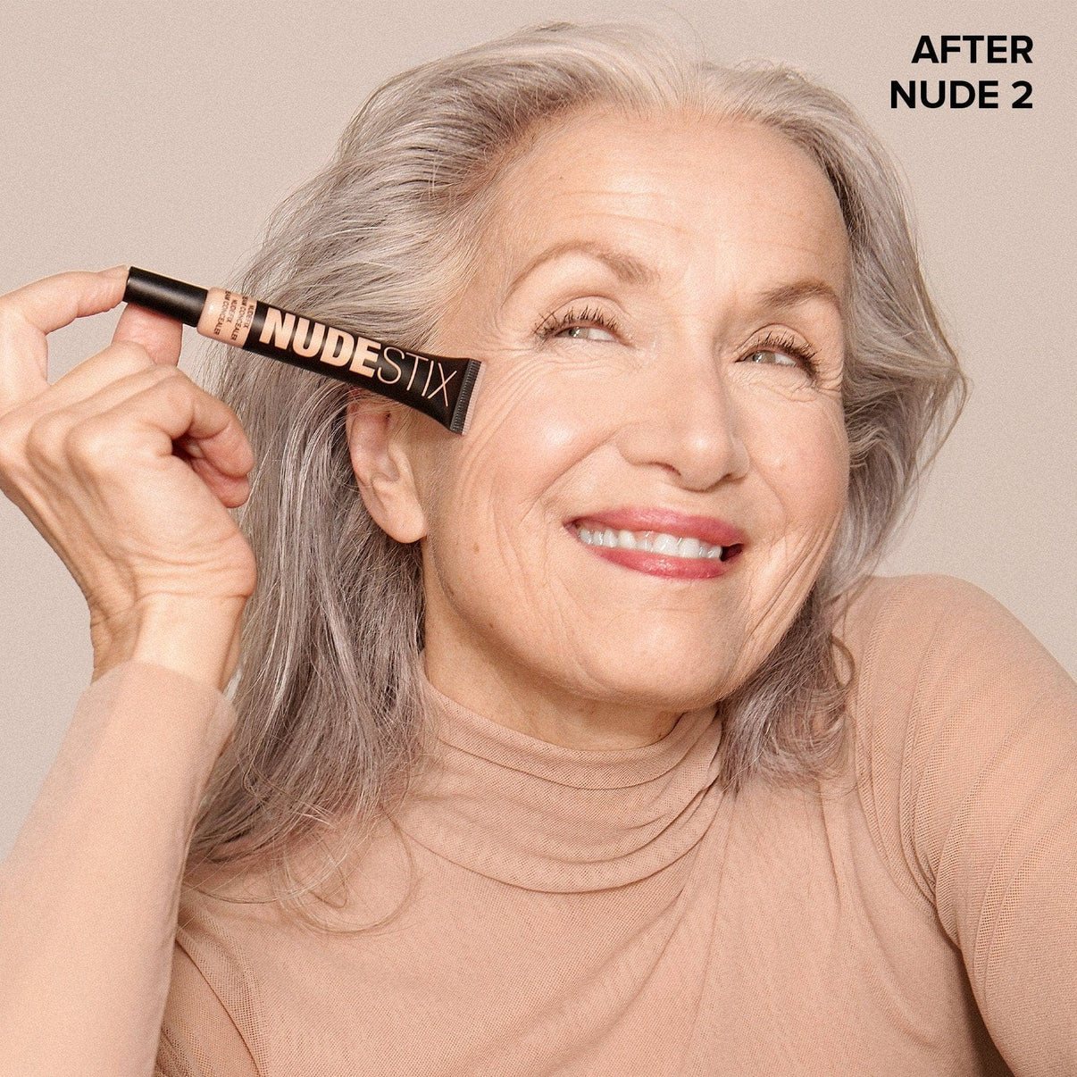 Light skinned mature woman after wearing Nudefix cream concealer in shade nude 2