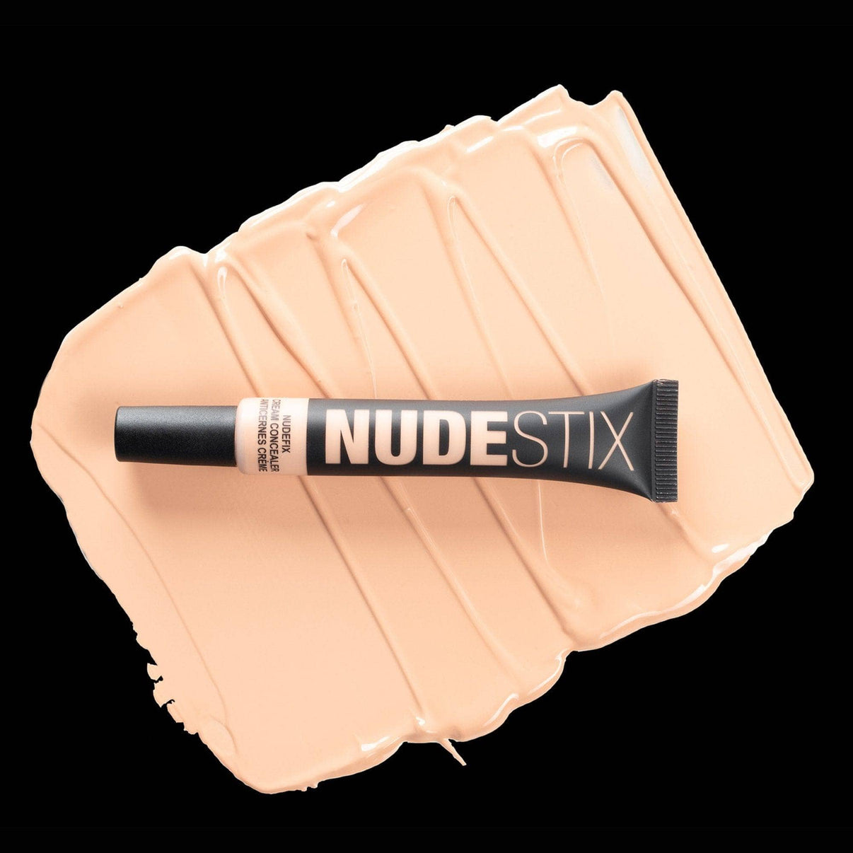 Nudefix cream concealer in shade nude 3 on top of texture swatch
