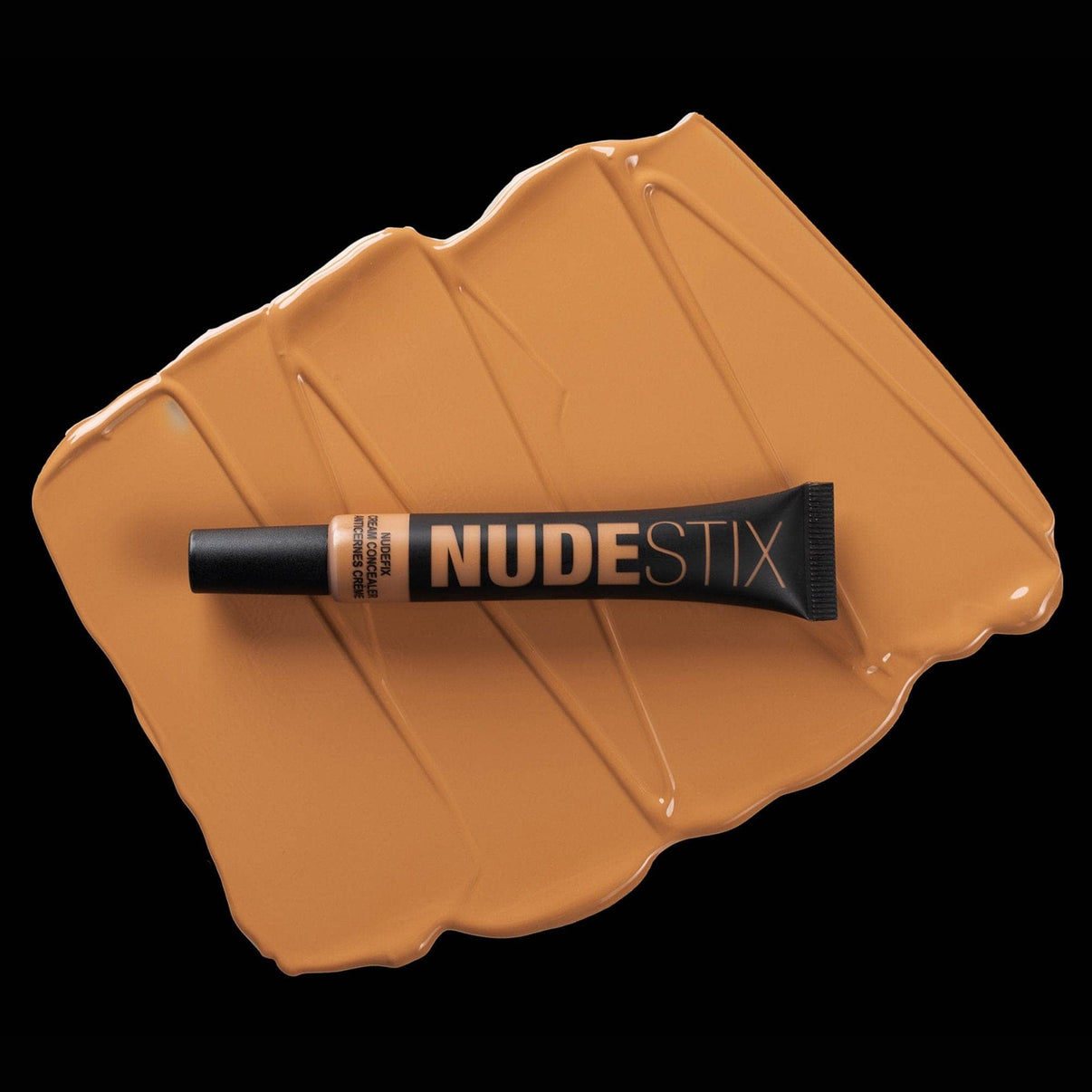 Nudefix cream concealer in shade nude 8 on top of texture swatch